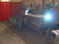 Flank of shear frame being manufactured, back to back welding with camber to obtain straight flanks after deformation due to welding.